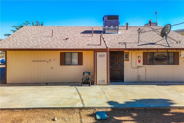 back of house featuring central AC and a patio area