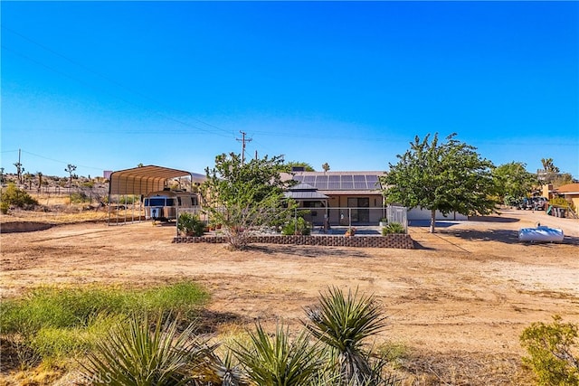 exterior space featuring a carport