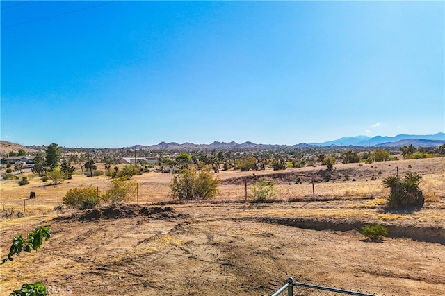 property view of mountains with a rural view