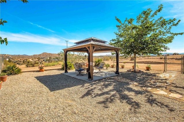 view of yard featuring a gazebo and a patio