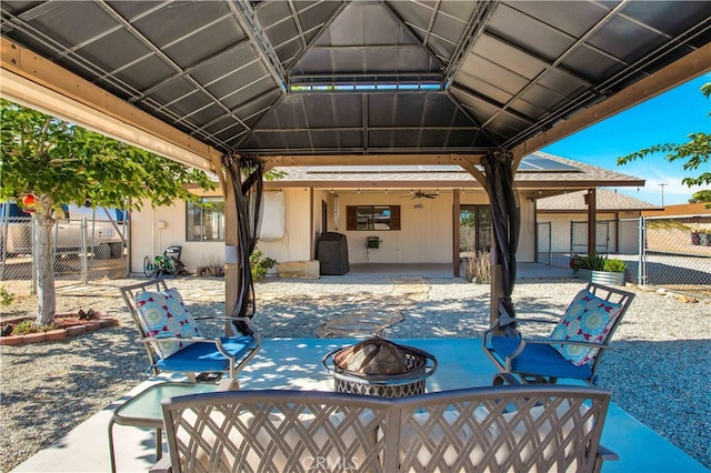 view of patio / terrace featuring a fire pit