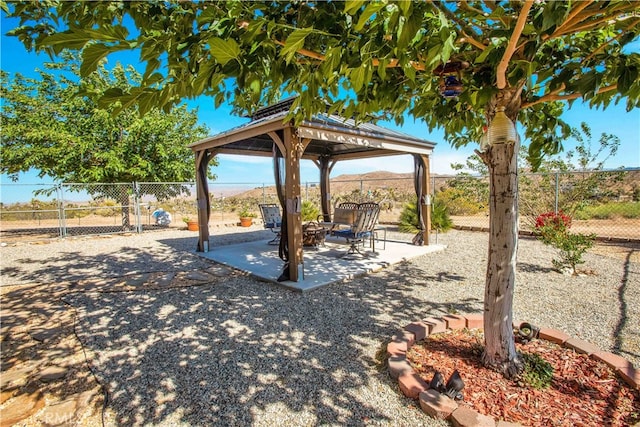 view of yard featuring a patio area and a gazebo