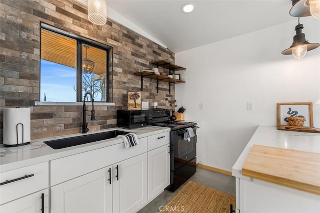 65154 Hoover Rd, Joshua Tree, CA 92252 - kitchen with electric range, decorative backsplash, light countertops, white cabinetry, and open shelves