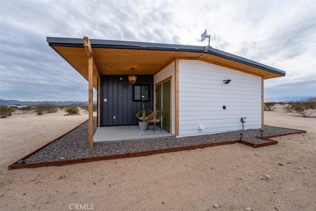 back of property with a patio area