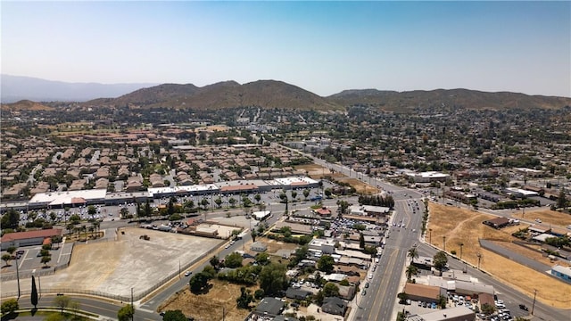 birds eye view of property featuring a mountain view