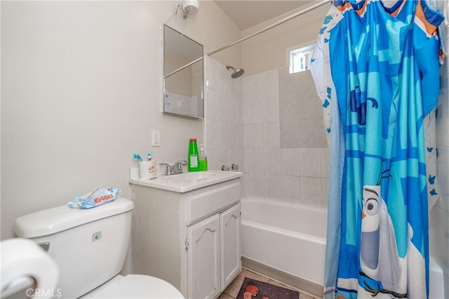 full bath with toilet, shower / bath combo with shower curtain, vanity, and tile patterned floors