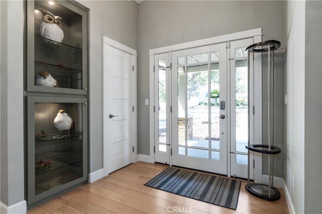 doorway to outside with light hardwood / wood-style flooring