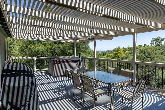 wooden terrace with a pergola and ceiling fan