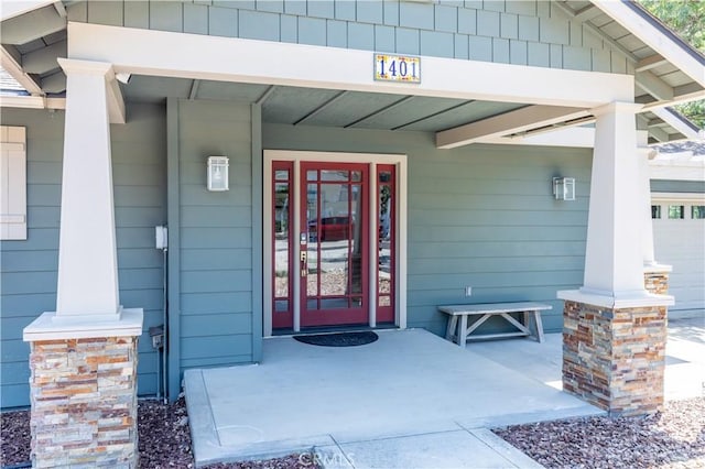 property entrance featuring a porch