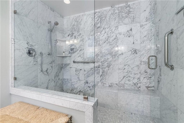 bathroom featuring a tile shower