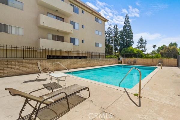 view of pool with a patio area