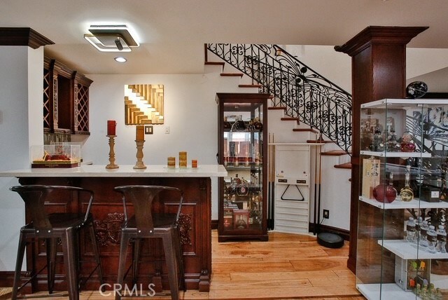 bar featuring wood-type flooring