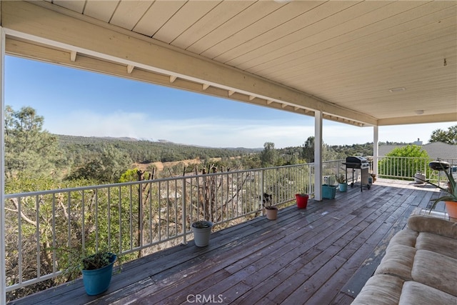 deck featuring a grill