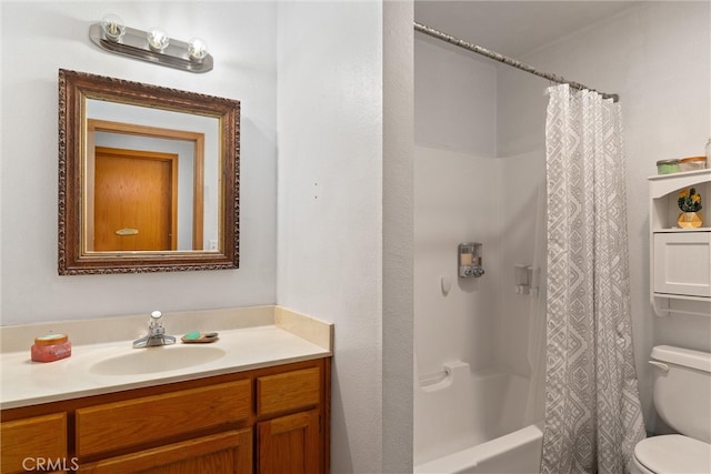 full bathroom featuring shower / bathtub combination with curtain, toilet, and vanity