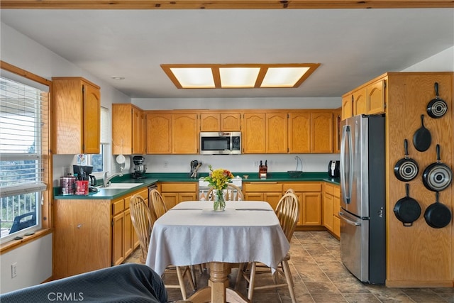 kitchen featuring appliances with stainless steel finishes and sink