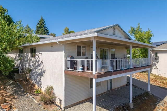 exterior space featuring central AC unit