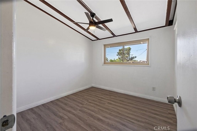 spare room with dark wood-type flooring, ceiling fan, and lofted ceiling