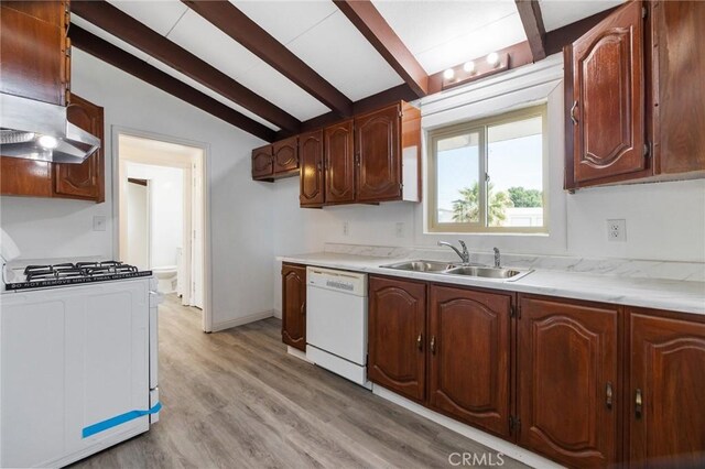 kitchen featuring white appliances, sink, light hardwood / wood-style flooring, vaulted ceiling with beams, and extractor fan