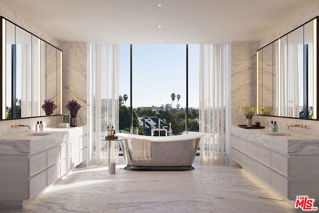 bathroom featuring a bathing tub and vanity