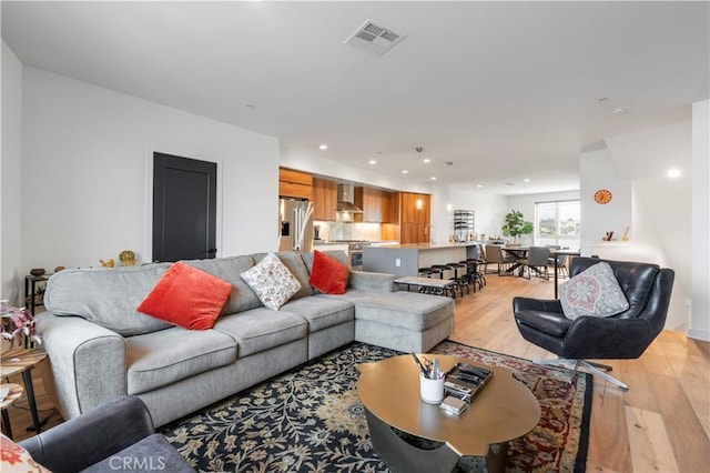 living room featuring light hardwood / wood-style floors