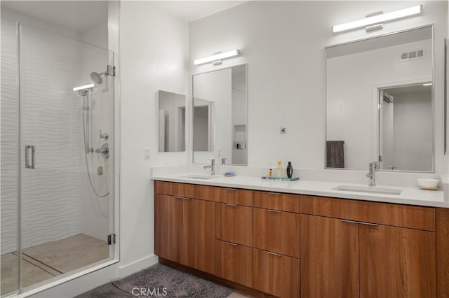 bathroom featuring vanity and walk in shower