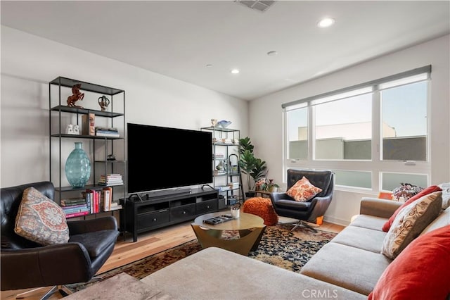 living room with hardwood / wood-style floors