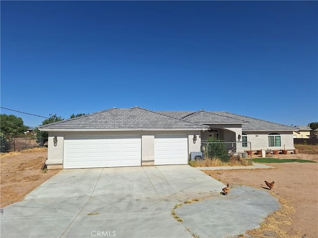 view of front of home featuring a garage