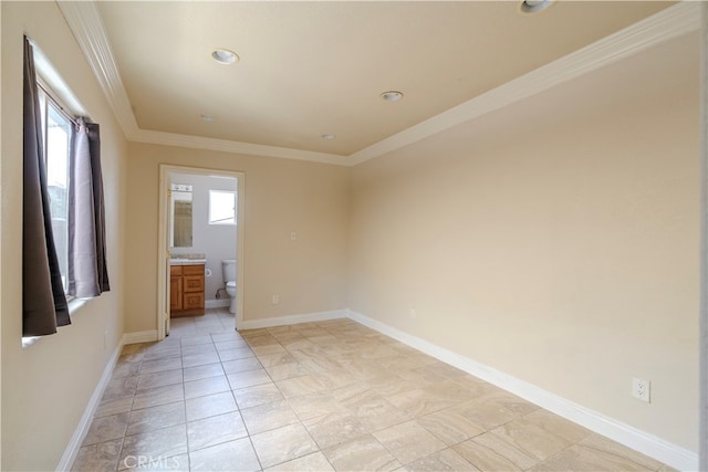 spare room featuring ornamental molding