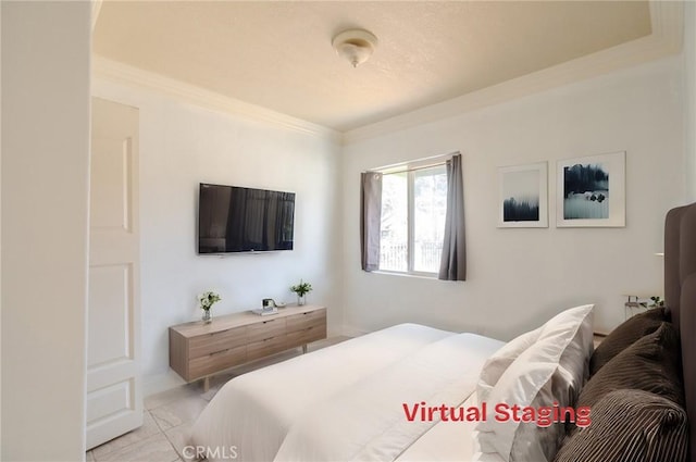 bedroom featuring crown molding