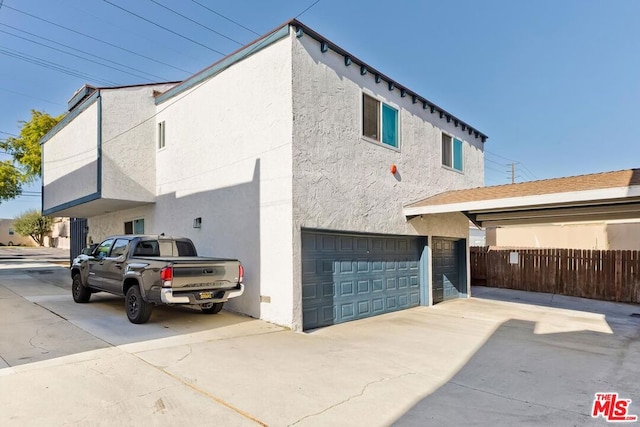 view of home's exterior with a garage