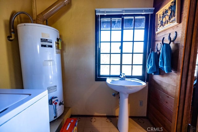 bathroom featuring electric water heater