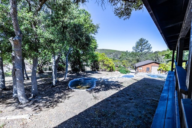 view of yard with a mountain view