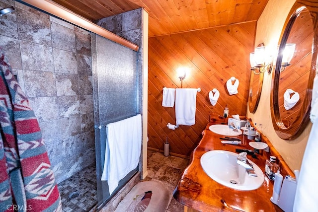 bathroom with wood walls, vanity, wood ceiling, and an enclosed shower