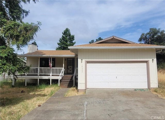 ranch-style house with a porch and a garage