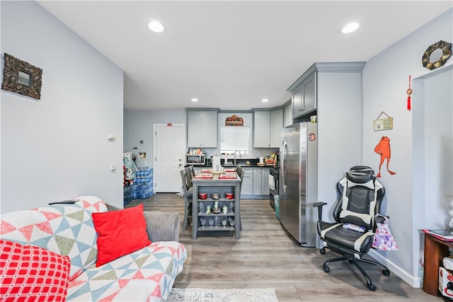 living room featuring light wood-type flooring