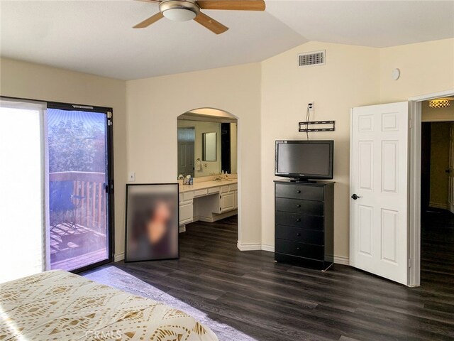 unfurnished bedroom featuring access to outside, sink, ceiling fan, connected bathroom, and dark hardwood / wood-style flooring