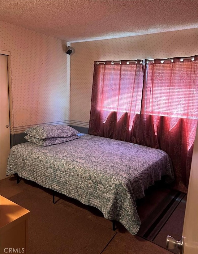 bedroom with a textured ceiling