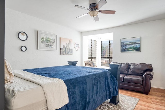 bedroom featuring ceiling fan and wood-type flooring