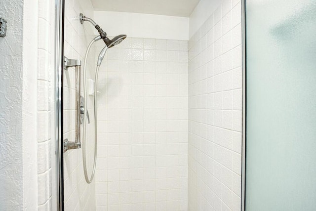 room details with an enclosed shower