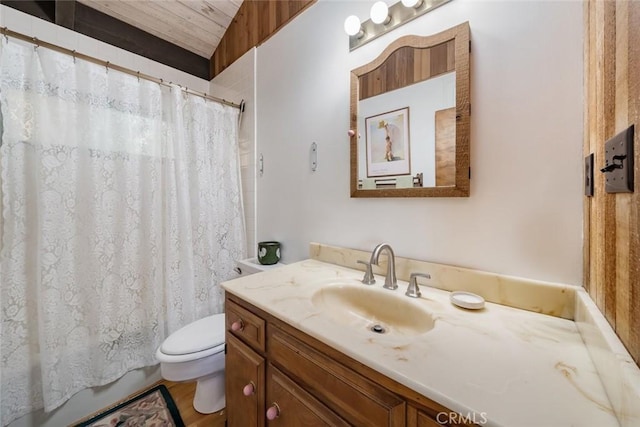 bathroom with walk in shower, wood ceiling, vanity, and toilet