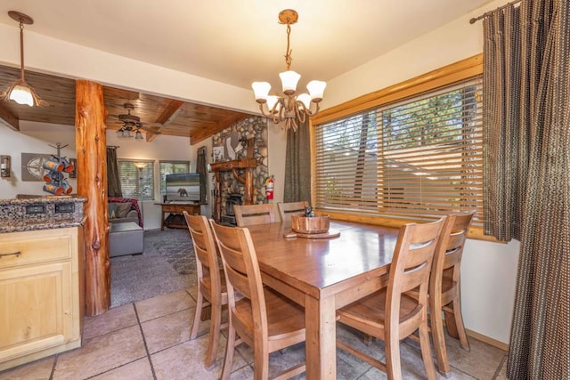 dining area with wood ceiling, light tile patterned floors, a fireplace, lofted ceiling with beams, and ceiling fan with notable chandelier