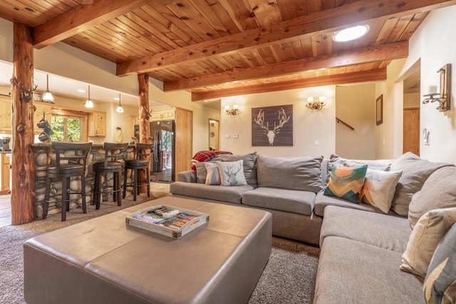 carpeted living room featuring wood ceiling and beamed ceiling