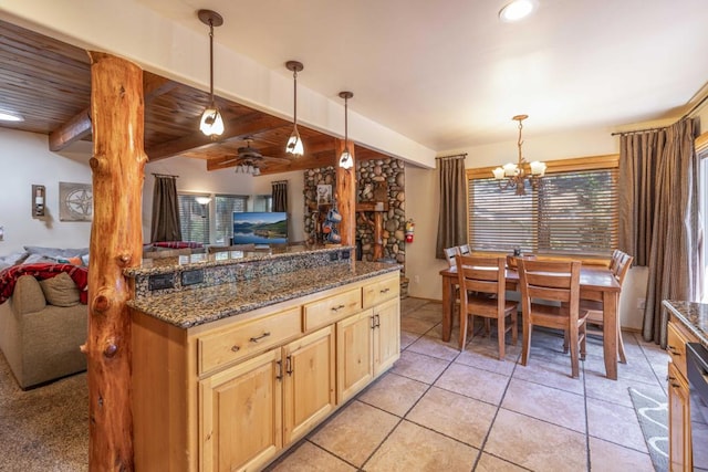 kitchen featuring wooden ceiling, ceiling fan with notable chandelier, beamed ceiling, and pendant lighting