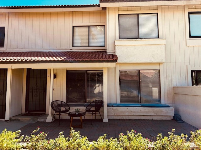 rear view of house featuring a patio area