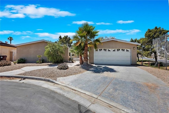 ranch-style house featuring a garage