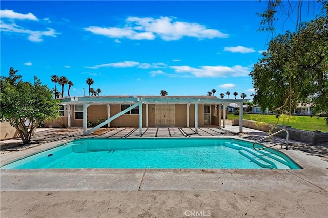 view of pool with a patio area