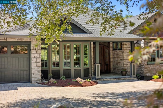 view of front of property with a garage