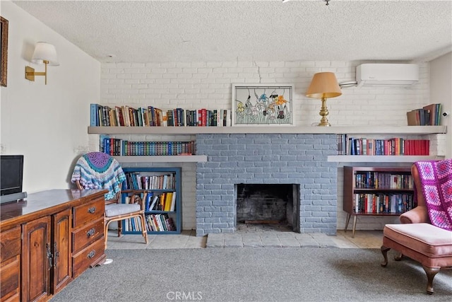 sitting room featuring a wall mounted air conditioner, light carpet, a textured ceiling, and a fireplace