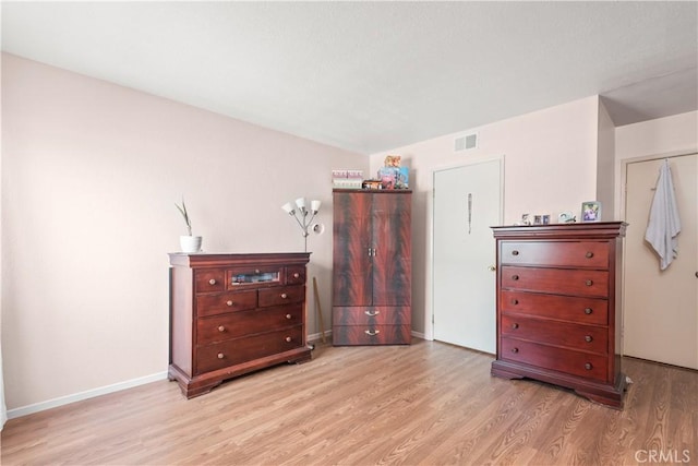 bedroom featuring light hardwood / wood-style floors