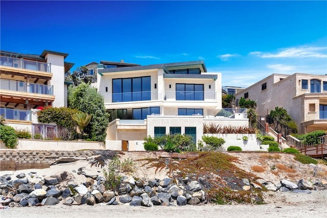 modern home featuring a balcony